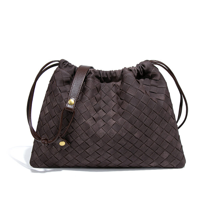 LA POCHETTE EN FAUX DAIM À CORDON DE SERRAGE