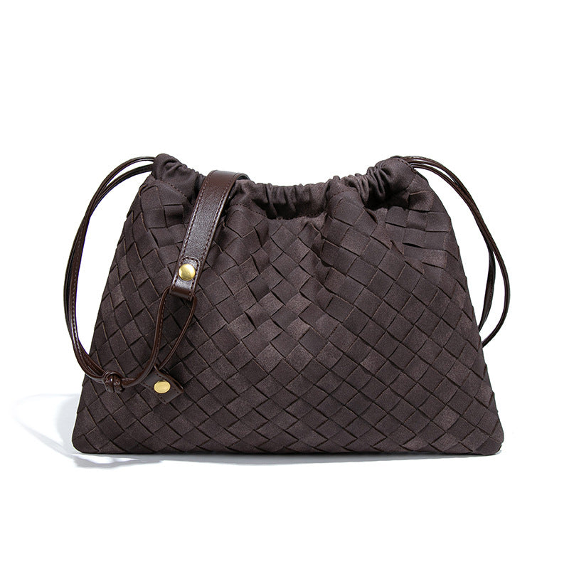 LA POCHETTE EN FAUX DAIM À CORDON DE SERRAGE