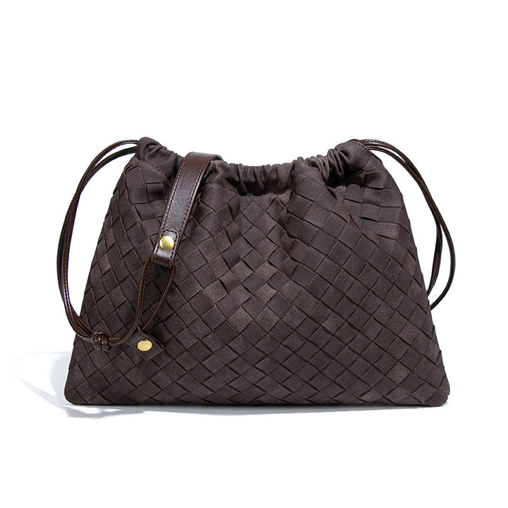 LA POCHETTE EN FAUX DAIM À CORDON DE SERRAGE