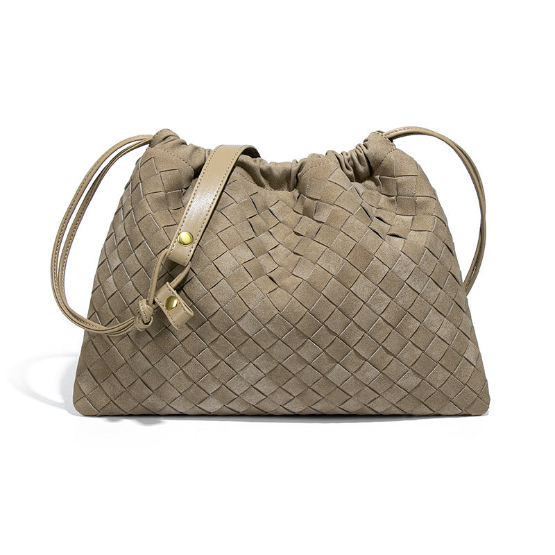 LA POCHETTE EN FAUX DAIM À CORDON DE SERRAGE