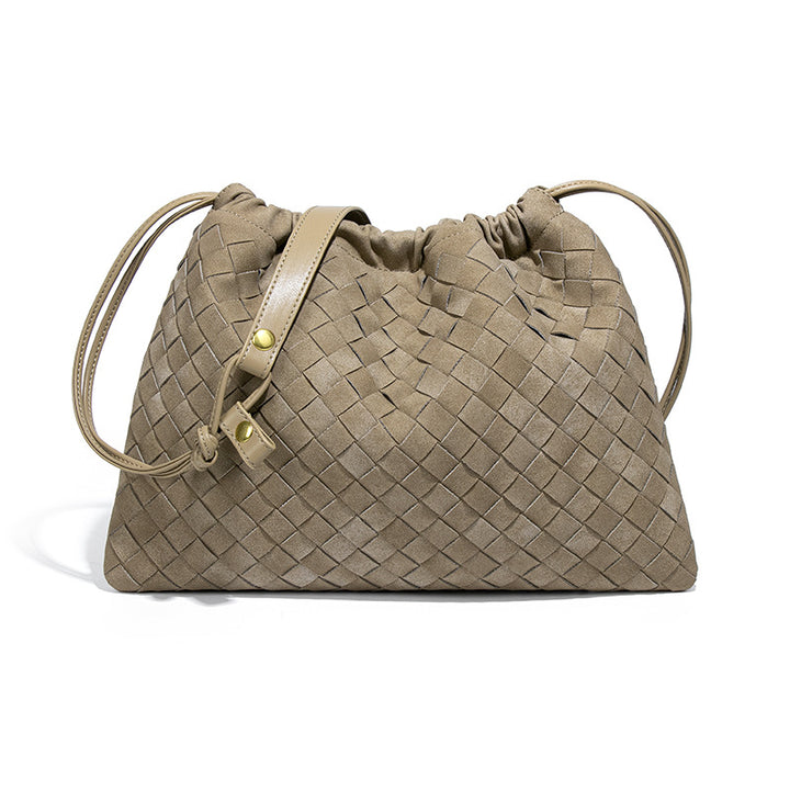 LA POCHETTE EN FAUX DAIM À CORDON DE SERRAGE