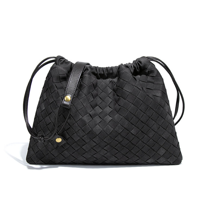 LA POCHETTE EN FAUX DAIM À CORDON DE SERRAGE