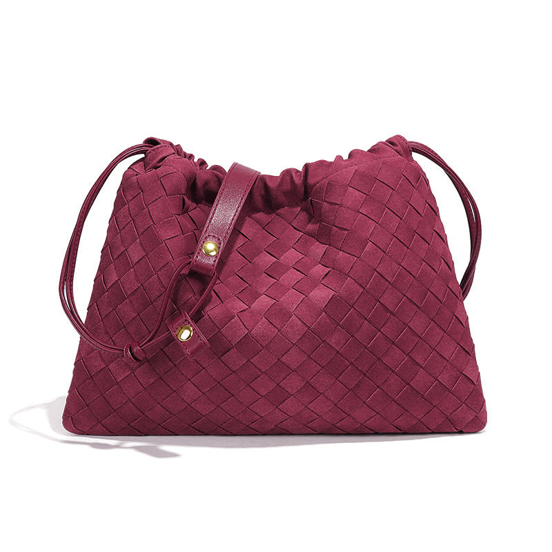 LA POCHETTE EN FAUX DAIM À CORDON DE SERRAGE