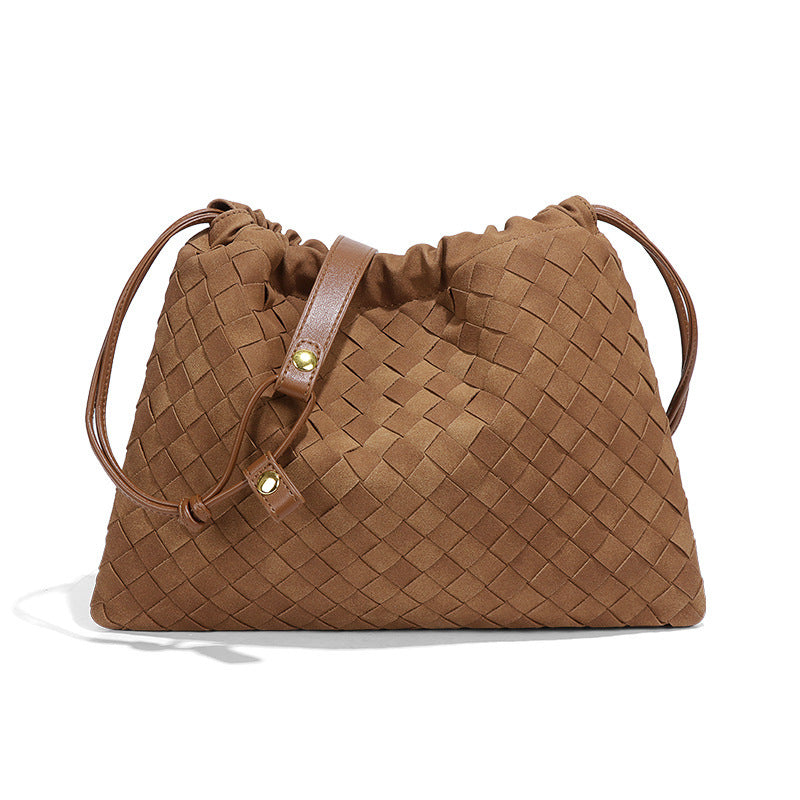 LA POCHETTE EN FAUX DAIM À CORDON DE SERRAGE