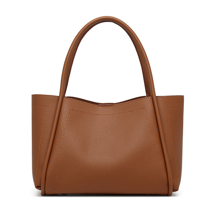 DIE STRUKTURIERTE LYCHEE-NARBENLEDER-TASCHE