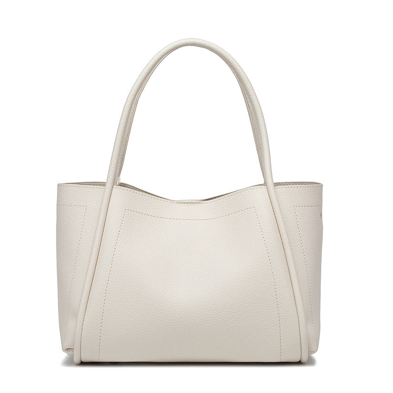 DIE STRUKTURIERTE LYCHEE-NARBENLEDER-TASCHE