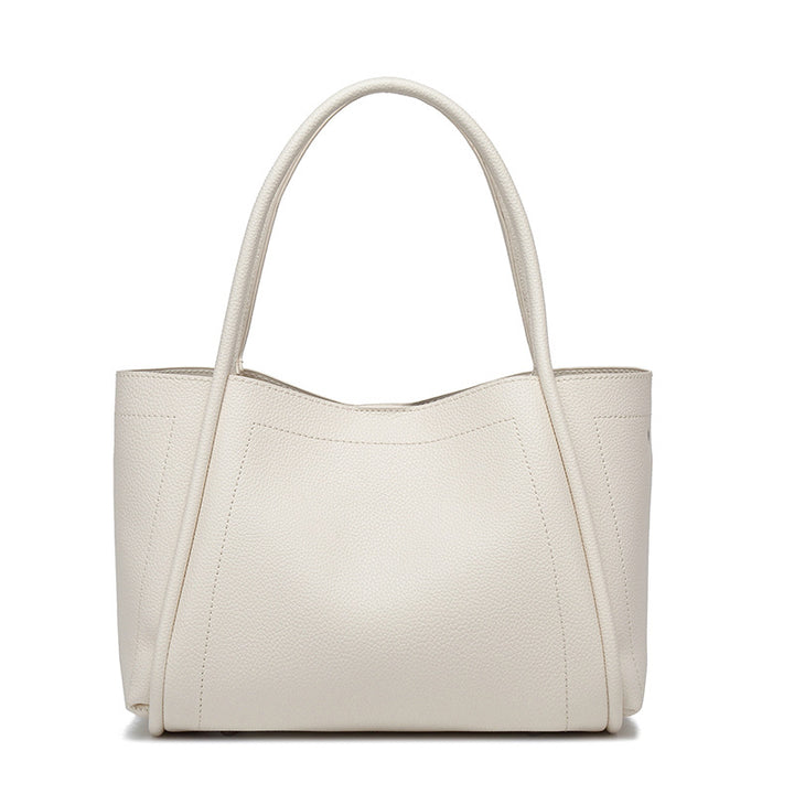 DIE STRUKTURIERTE LYCHEE-NARBENLEDER-TASCHE
