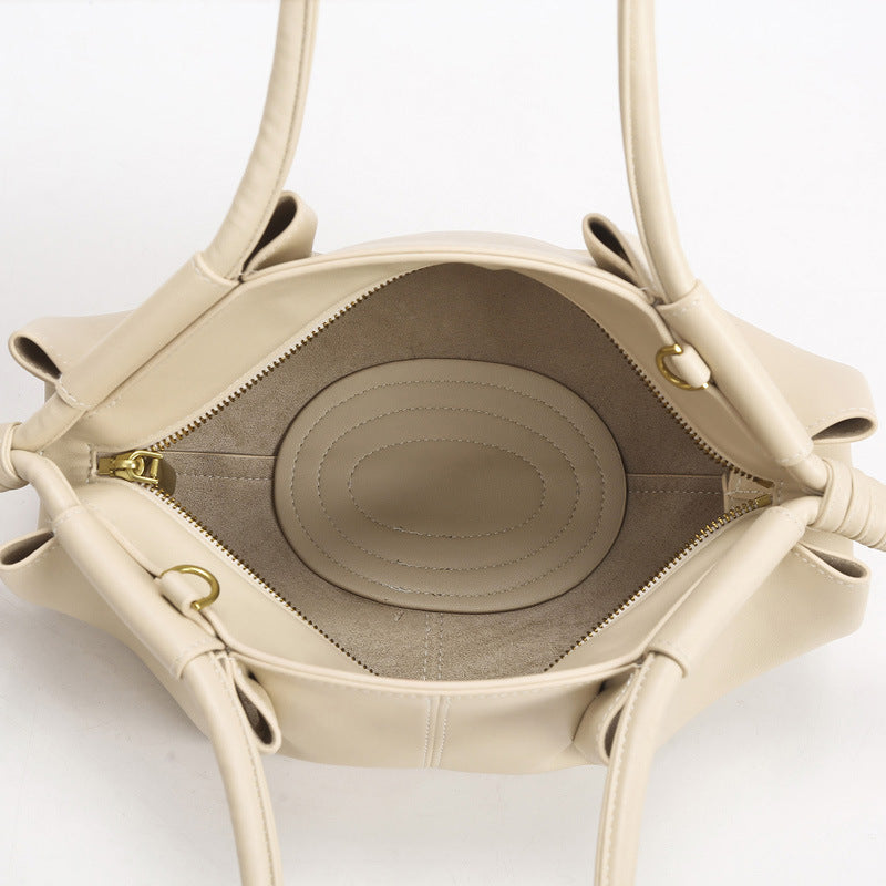 LE SAC-AUMÔNIÈRE PLISSÉ SCULPTURAL