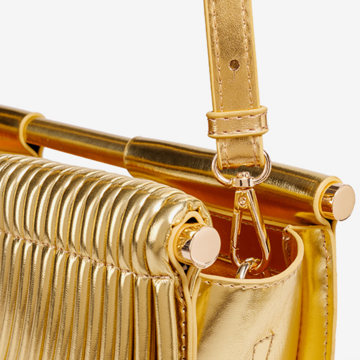 LA POCHETTE ARCHITECTURALE À PLIS RADIAUX