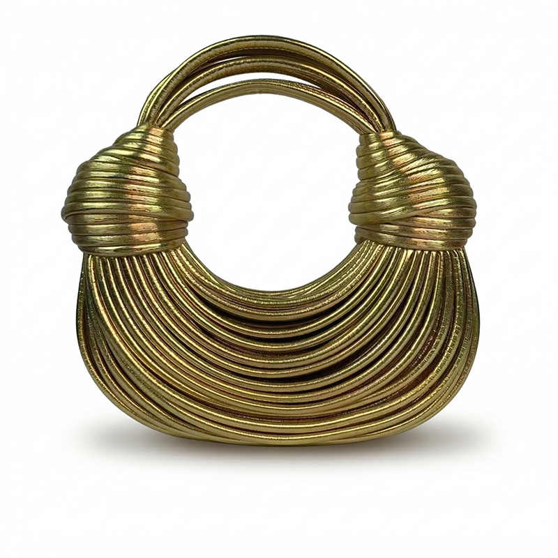 LE SAC À LA BOBINE DORÉE