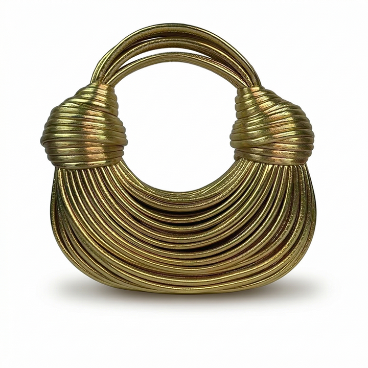 LE SAC À LA BOBINE DORÉE