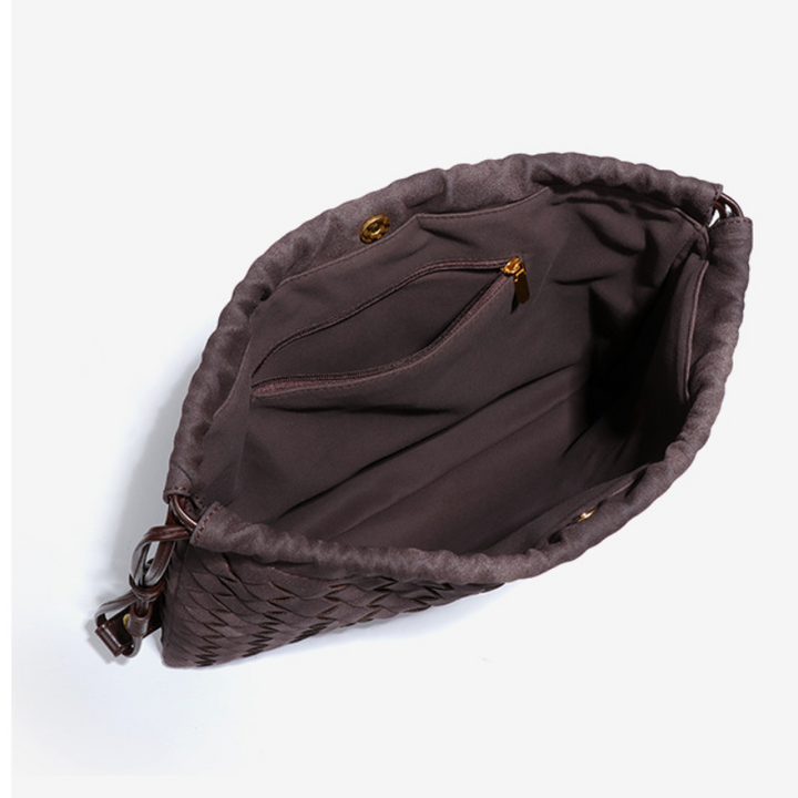 LA POCHETTE EN FAUX DAIM À CORDON DE SERRAGE