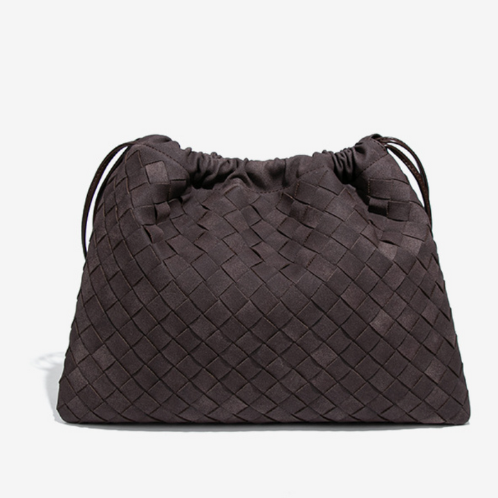 LA POCHETTE EN FAUX DAIM À CORDON DE SERRAGE