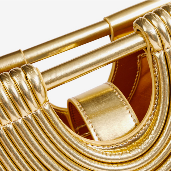 LA POCHETTE ARCHITECTURALE À PLIS RADIAUX